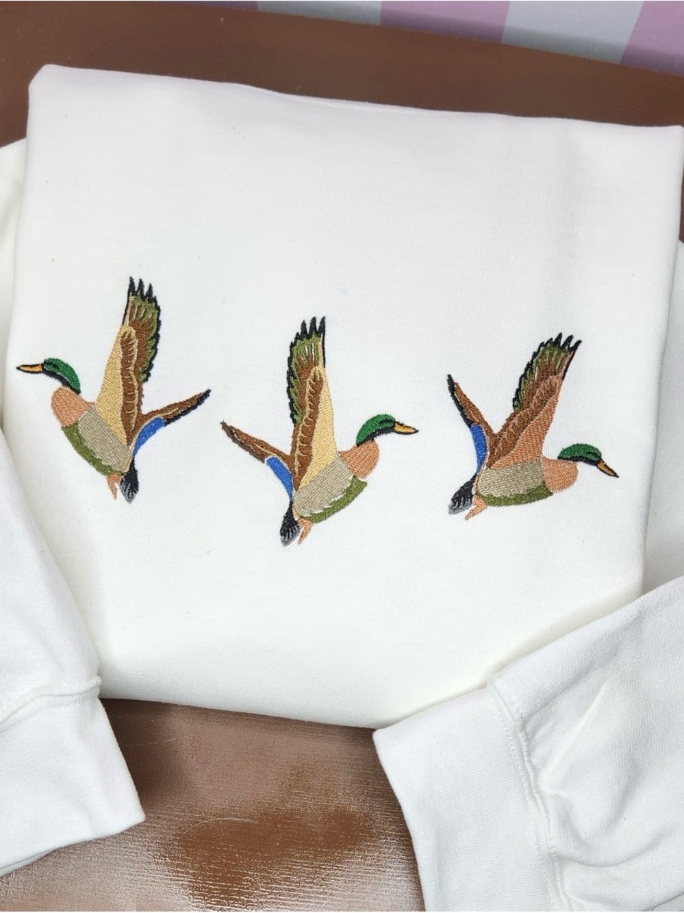 Unisex White Crewneck Sweater with Embroidered Mallard Trio